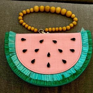 Hey shopper, I’m selling my !!Aldo!! Watermelon wrist bag. Super cute.